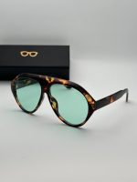 عینک همراه با کاور پارچه ای و دستمال رایگان میباشد لنز عینک یووی 400 ضد اشعه برای تهیه کیف به دسته بندی کیف عینک سر بزنید