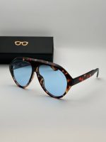 عینک همراه با کاور پارچه ای و دستمال رایگان میباشد لنز عینک یووی 400 ضد اشعه برای تهیه کیف به دسته بندی کیف عینک سر بزنید